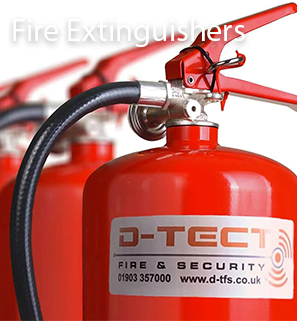 Fire extinguishers, lined up, with D-TECT stickers