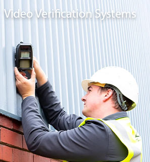 A D-TECT engineer installing video verification equipment to the exterior of a commercial building